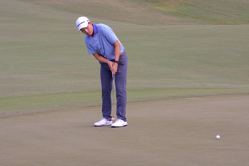 Dylan Wu putts to par the No. 18 hole at Lakewood National. He finished six under par on day one of the LECOM Suncoast Classic.