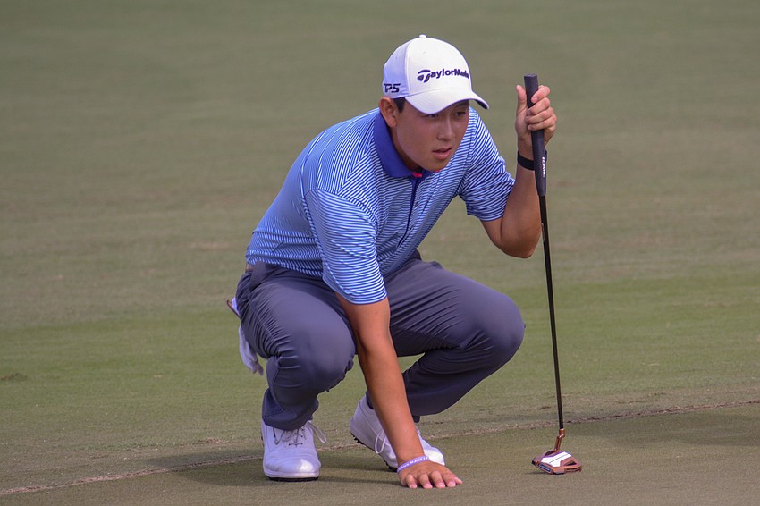 Dylan Wu lines up his putt on the No. 18 hole at Lakewood National. Wu finished six under par on day one of the LECOM Suncoast Classic.