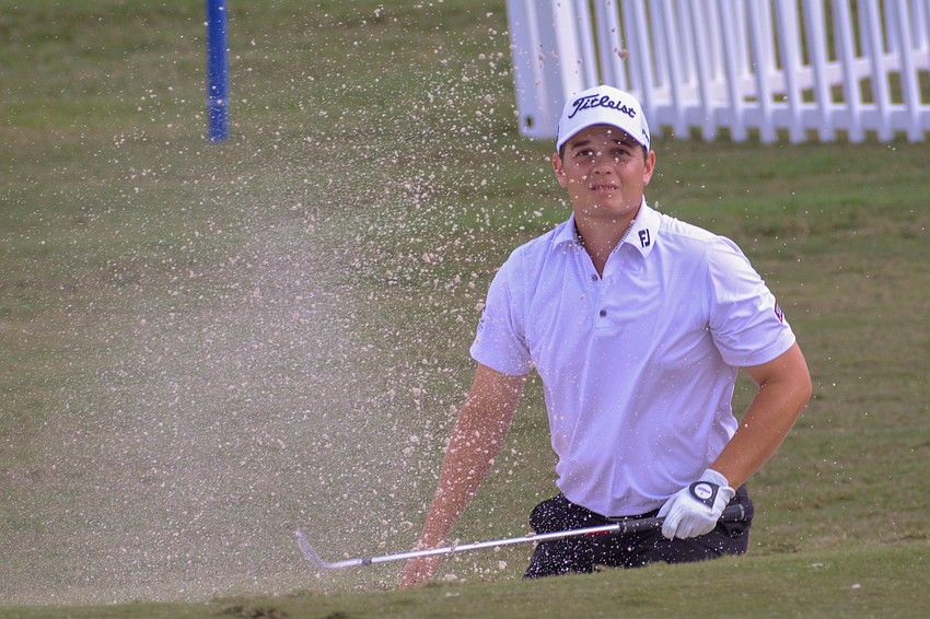 John VanDerLaan rescues a ball from the bunker. He finished two under par on the first day of the LECOM Suncoast Classic at Lakewood National.