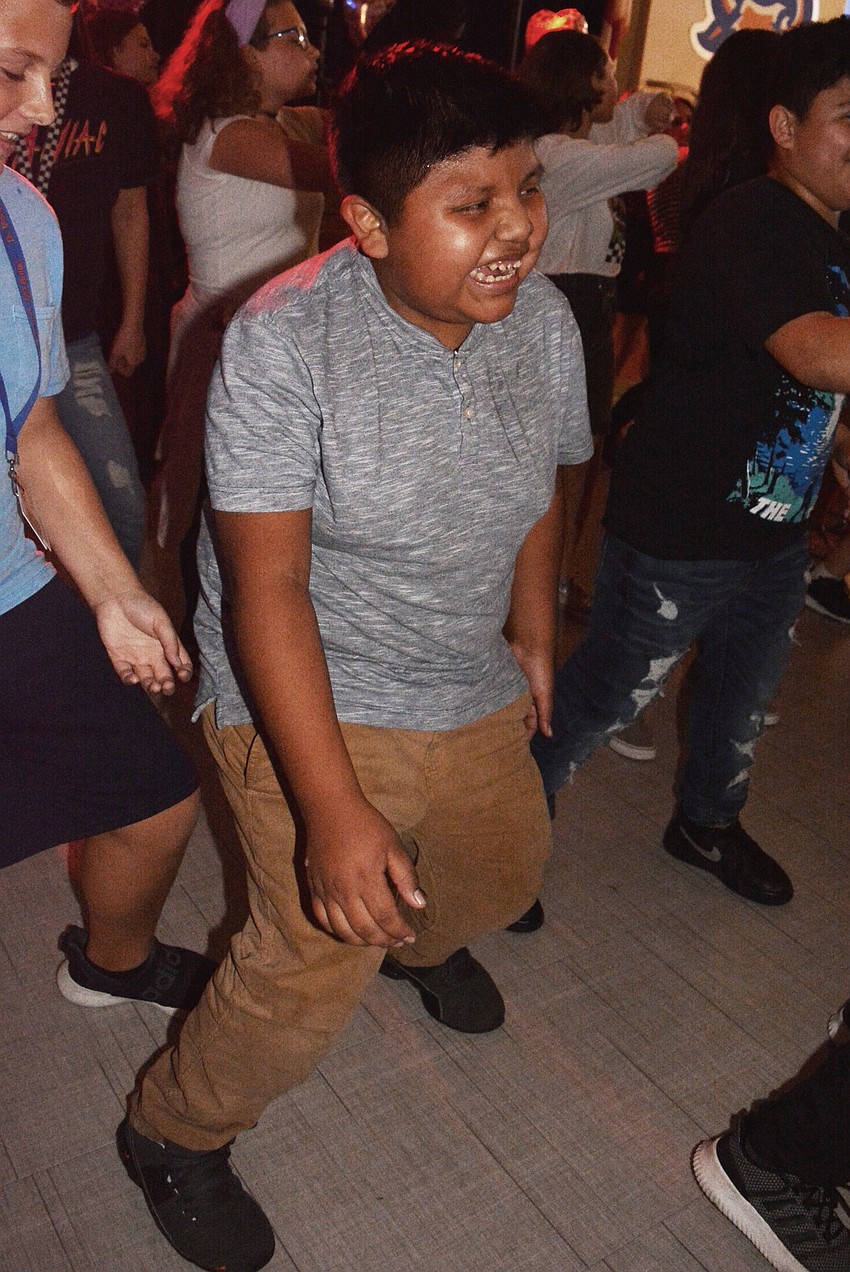 Sixth grader Edgar Mateo does the 