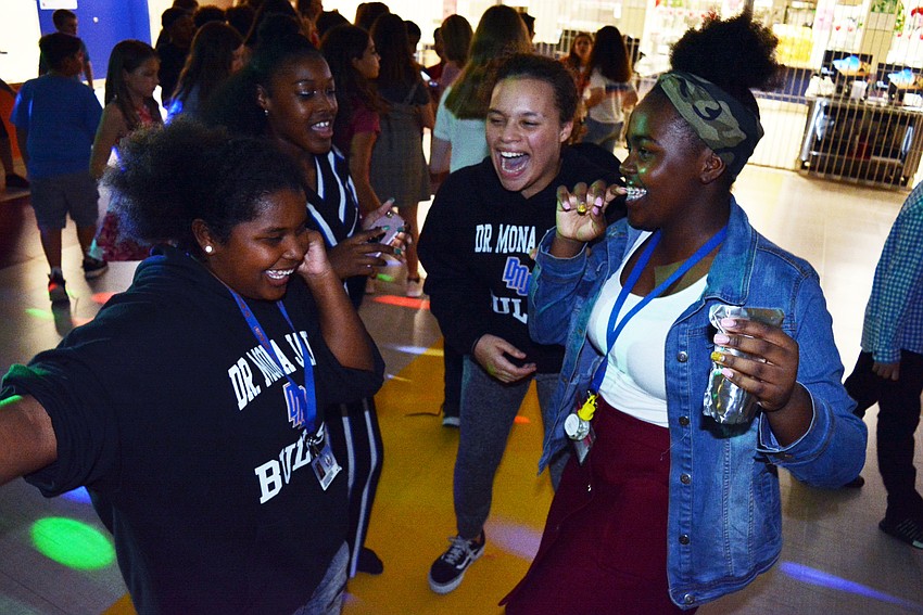 Clockwise from left: Seventh graders Tykia Robinson, Serenity River, Olivia Guyton and Madison Wilkins groove to 