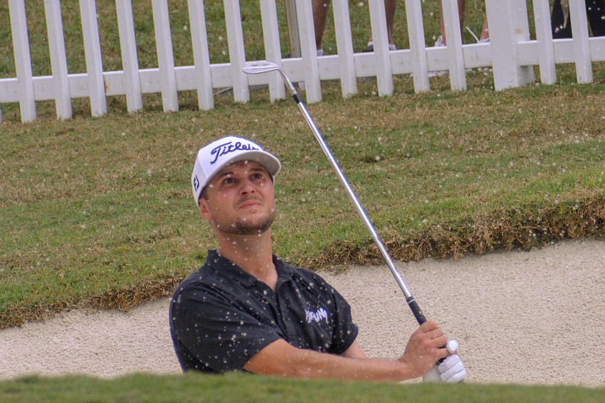 Kevin Lucas hits a shot out of a bunker on day two of the LECOM Suncoast Classic.