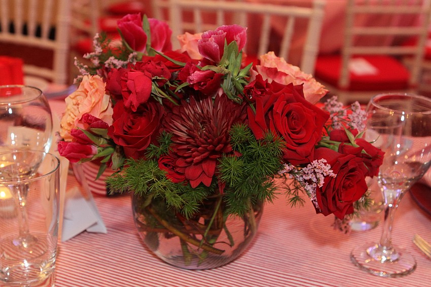 The dinner had Valentine's Day-themed decor.