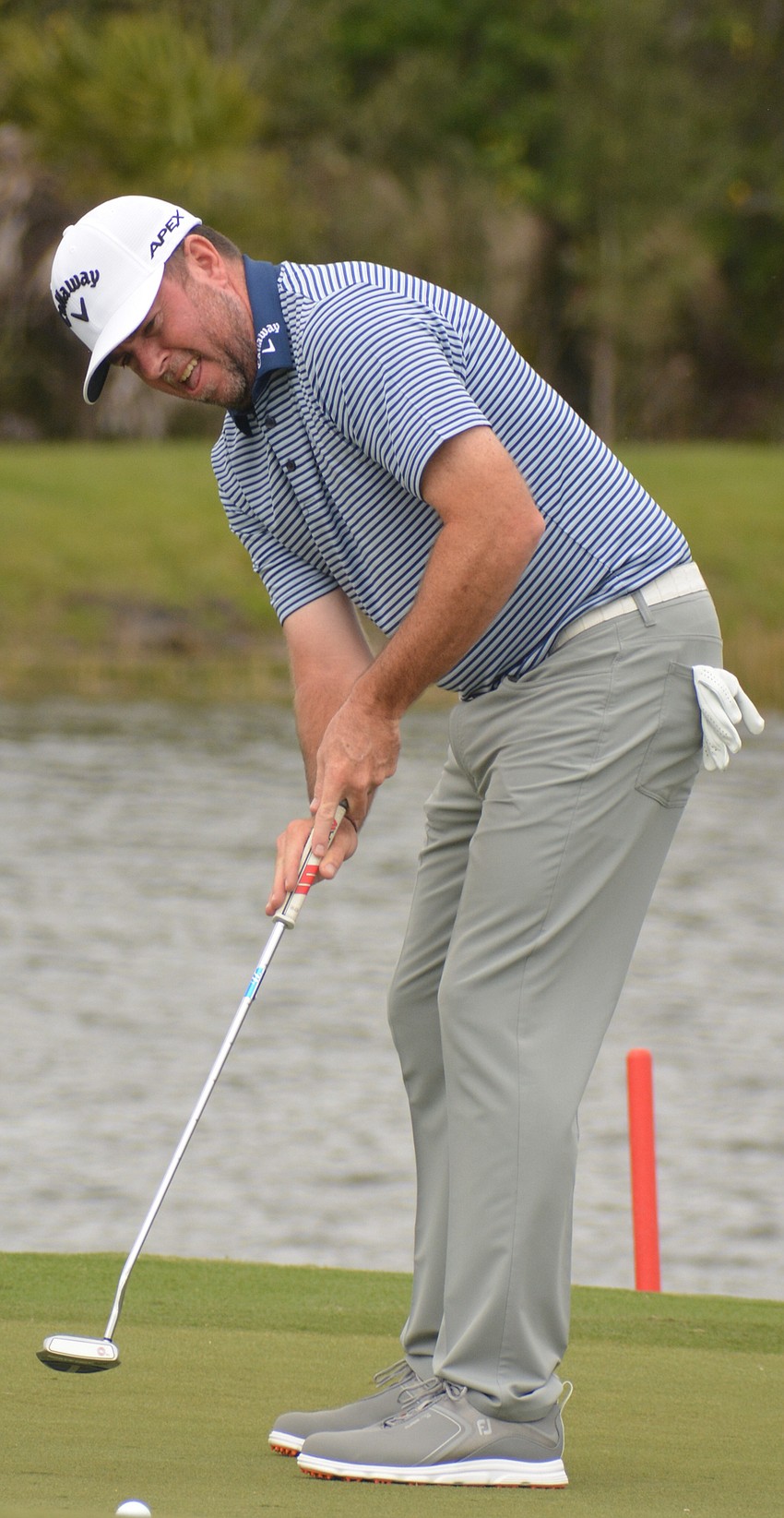 Robert Garrigus, who entered the day tied for the lead at 12 under par, putts for par on the No. 1 hole at Lakewood National. He finished 15 under par and tied for fourth.