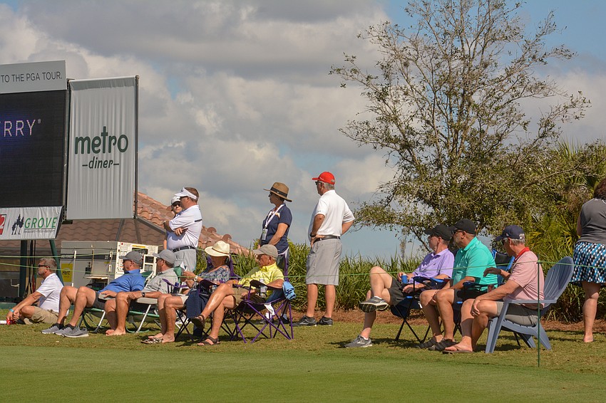 The LECOM Suncoast Classic crowd watches the green at hole No. 17 at Lakewood National.