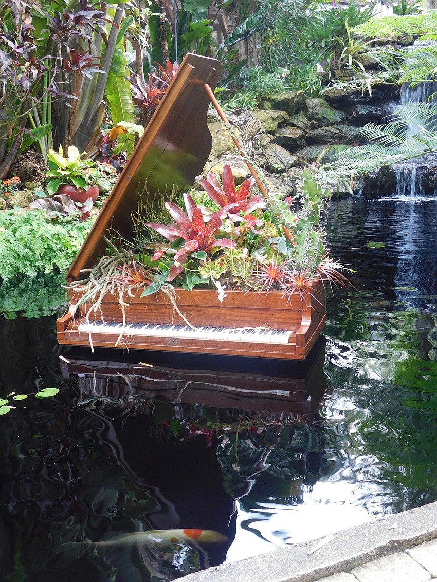 Cactus growing out of a piano standing in a koi pond emulates Dalí's use of juxtaposition in his images. (Klint Lowry)