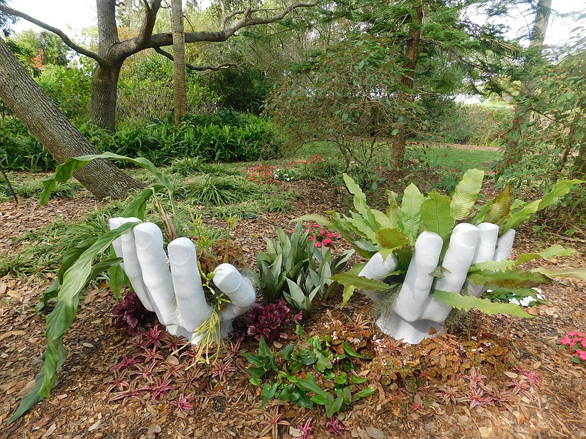 The staff at Selby Gardens set out transform the greenhouse and gardens into 