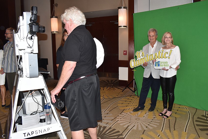 Paul and Sharon Saatsoglou get their pictures taken with TapSnap.