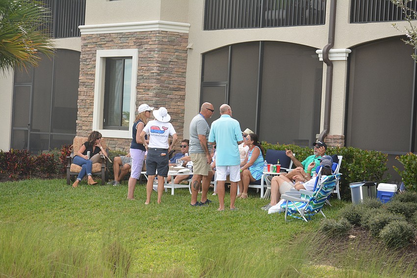 Some groups of Lakewood National residents camped out behind their homes to watch the tournament.