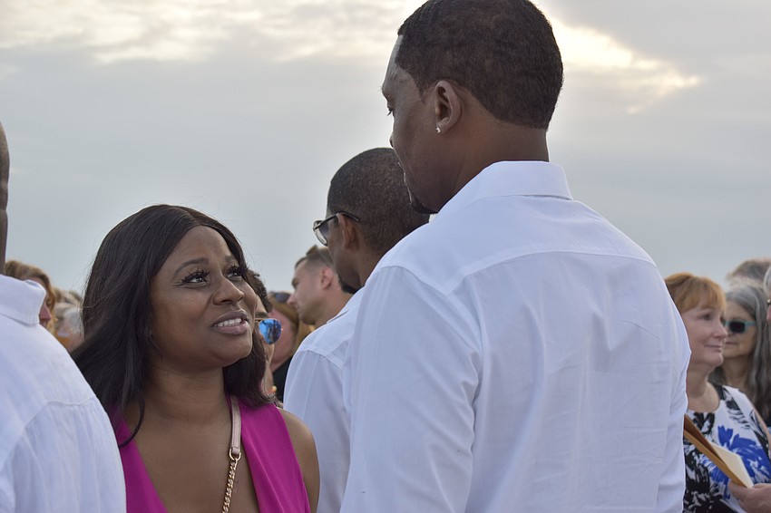 Brandi Thomas stares into her husband Darren's eyes while they say their vows.