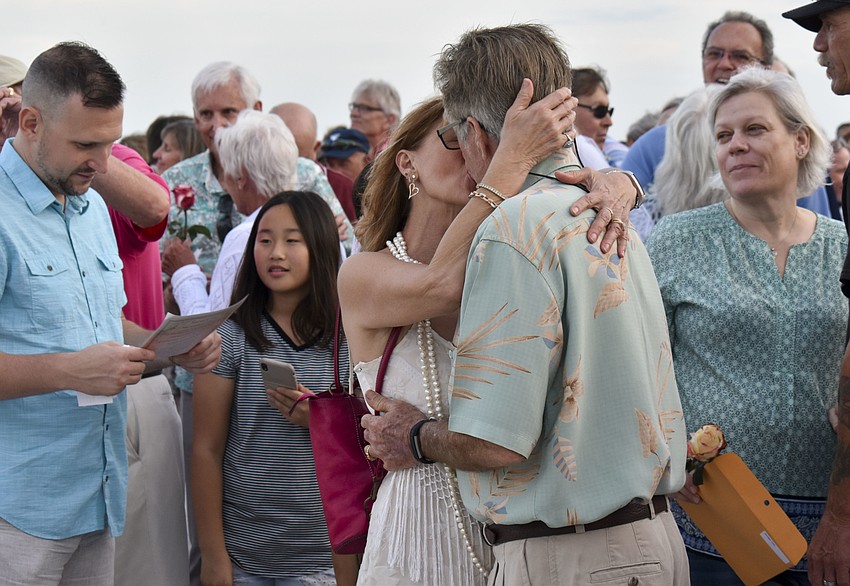 Jeanine and Greg Anderson share a kiss after they renewed their vows.