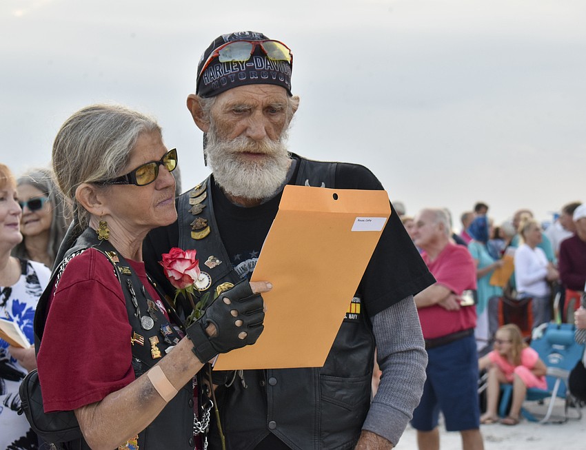 Ron and Cathy Rouse read their vow renewal.