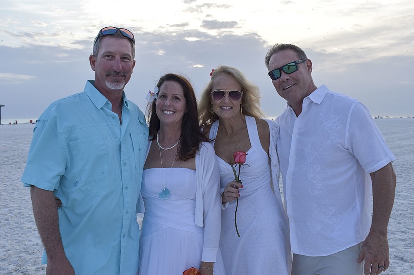 Tom and Heather Scarpinato with Diane and Kevin Kost