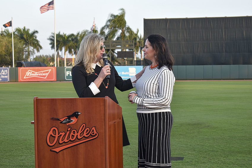 Sarasota Chamber of Commerce President Heather Kasten introduces Jennifer Grondahl , senior vice president, community development & communications