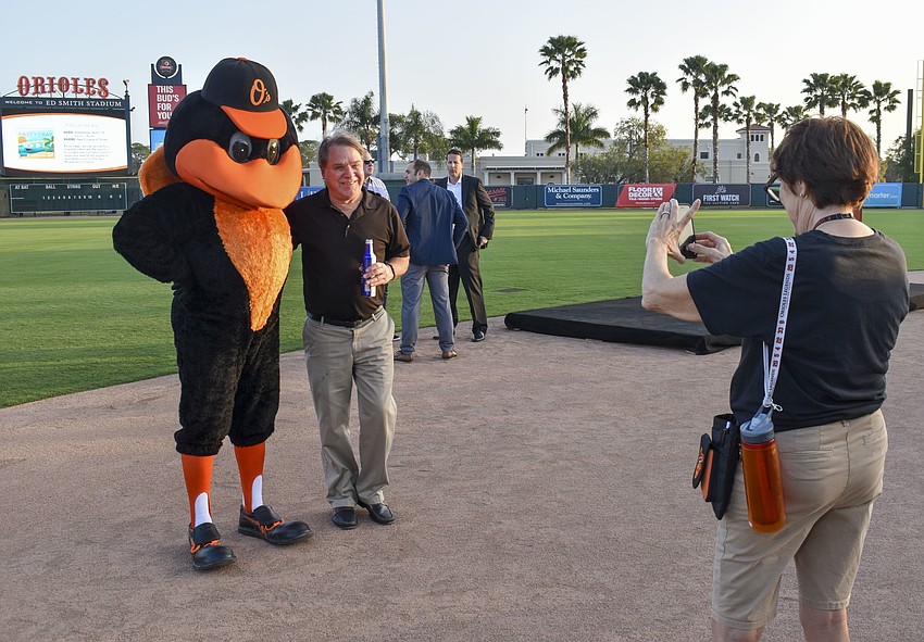 Jim Paulmann snaps a photos with The Oriole Bird
