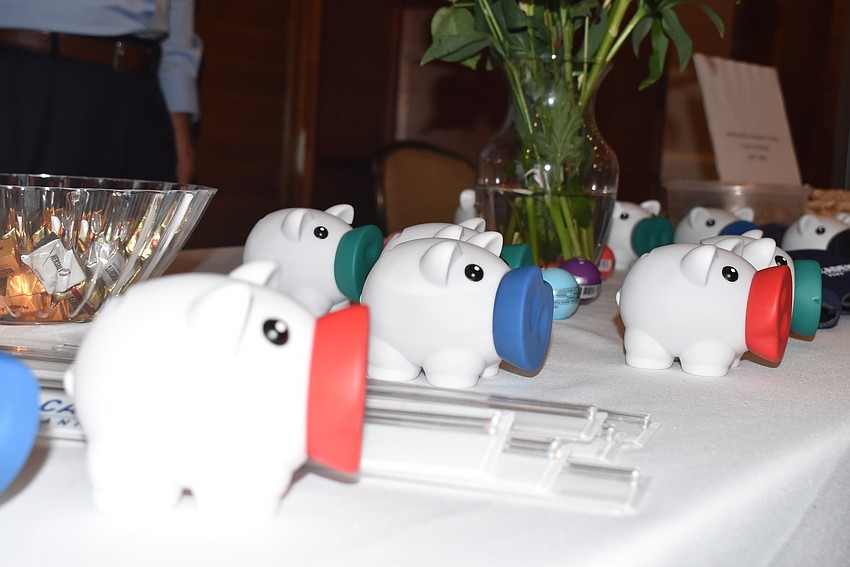 Cadence Bank offered tiny piggy banks to attendees.