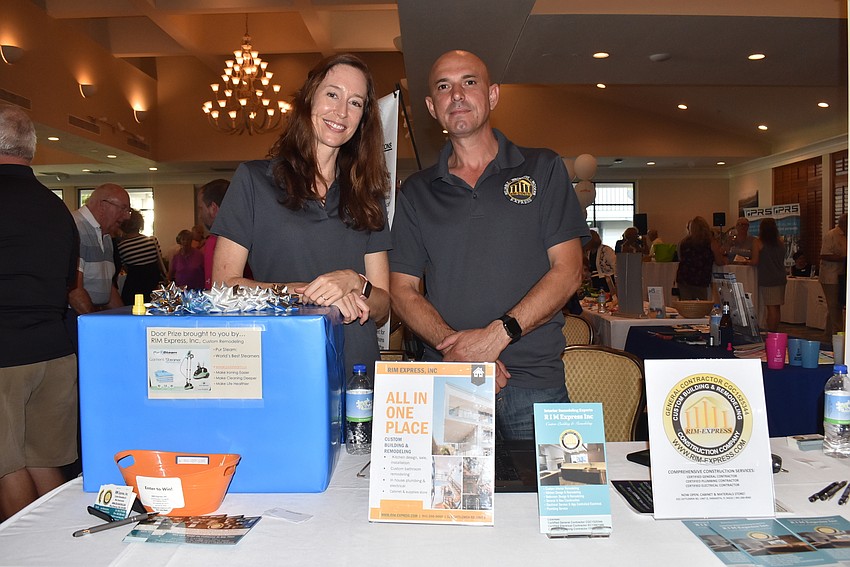 Rebecca Figueroa and Ivan Radosavljevic of VIP sponsor RIM Express Inc.