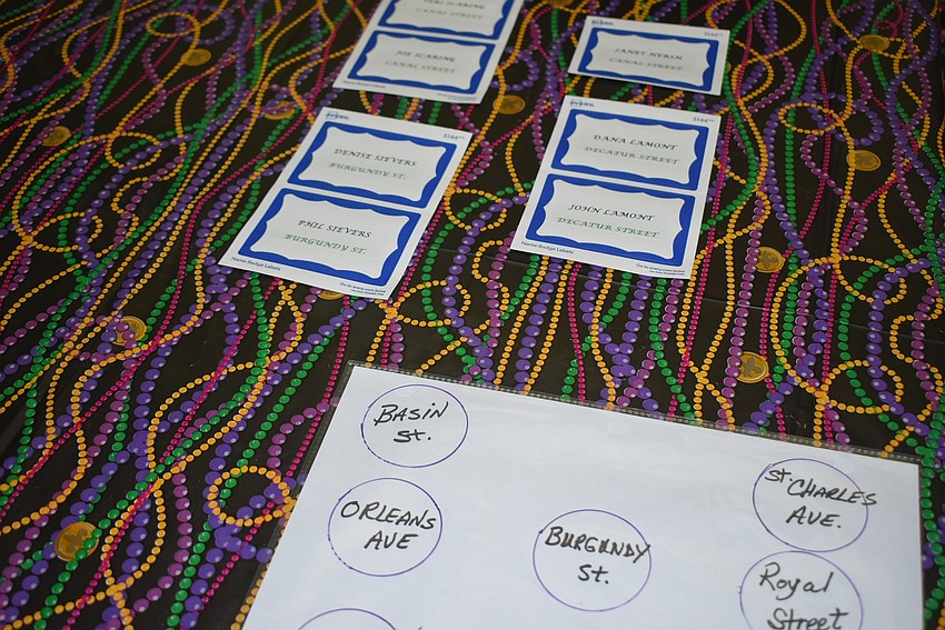 Attendees grabbed their name tags and headed to their street.