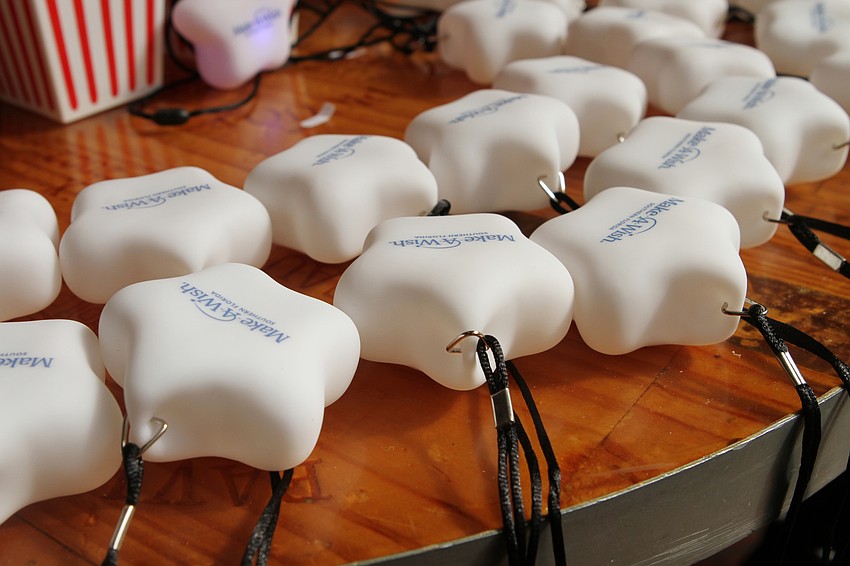 Guests went in on the raffle drawing with a star necklace.