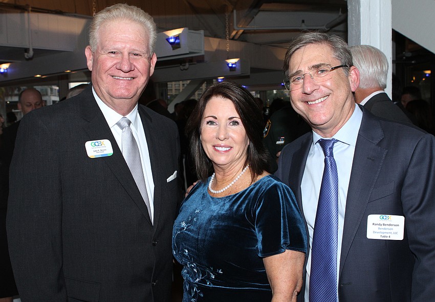 John Brown, Executive Director Mary Dougherty and Randy Benderson