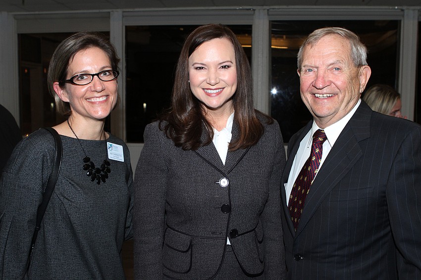 Amy Farrington, Attorney General Ashley Moody and former State Sen. Mike Bennett