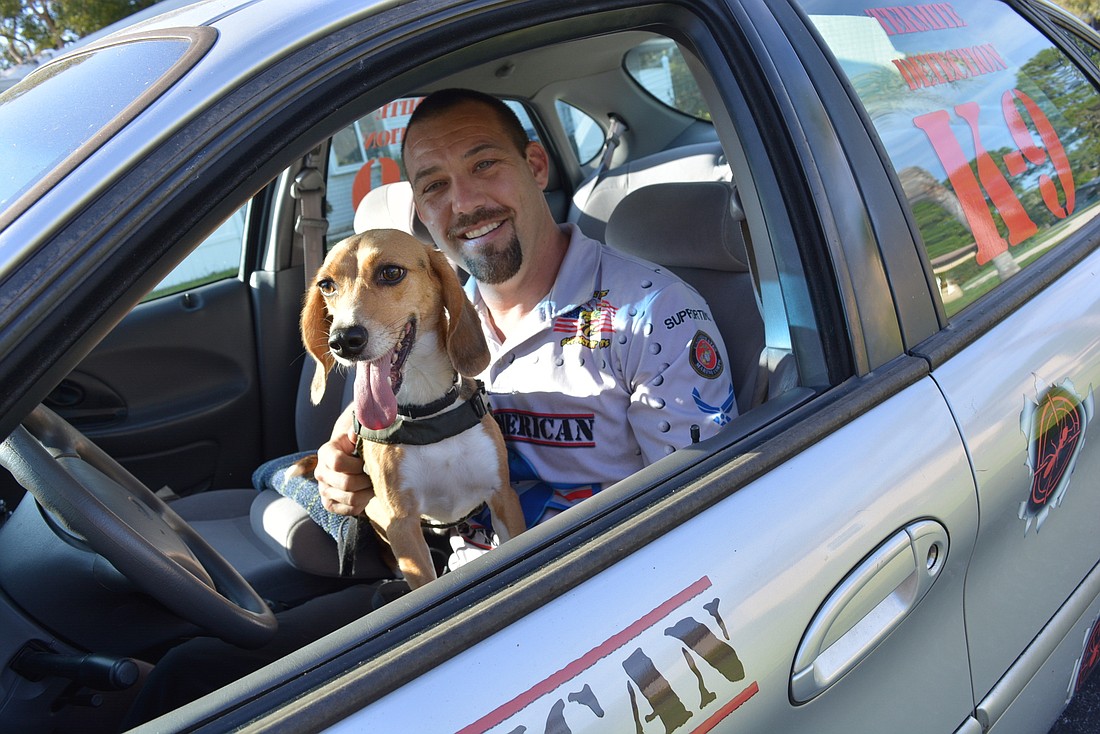 All American Pest Services owner Ron Freedman, with Sgt. Snitch, says his termite-hunting beagle is full of energy and eager to work for his food.
