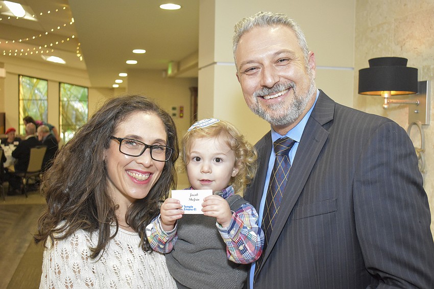 Rabbi Michael Shefrin with his wife Shayna and their son, Jacob.
