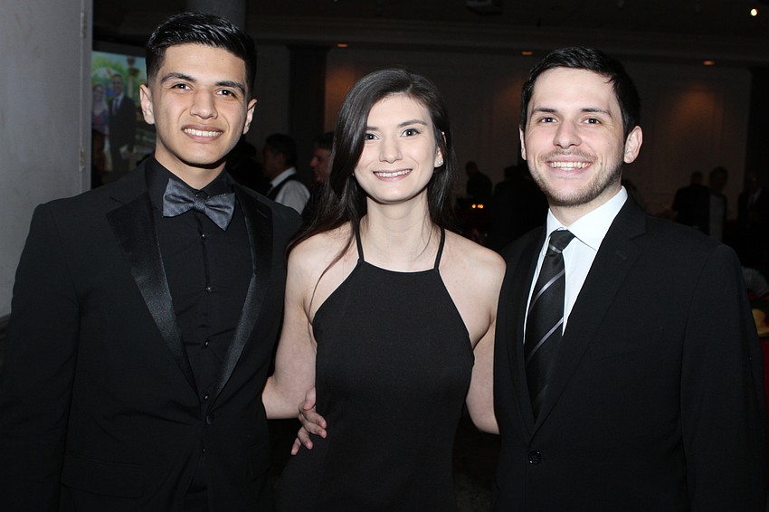 Jonathan and Gabrielle Barroso with Alexander Gomez