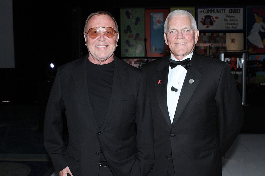 Michael Kors and president and CEO Richard Carlisle