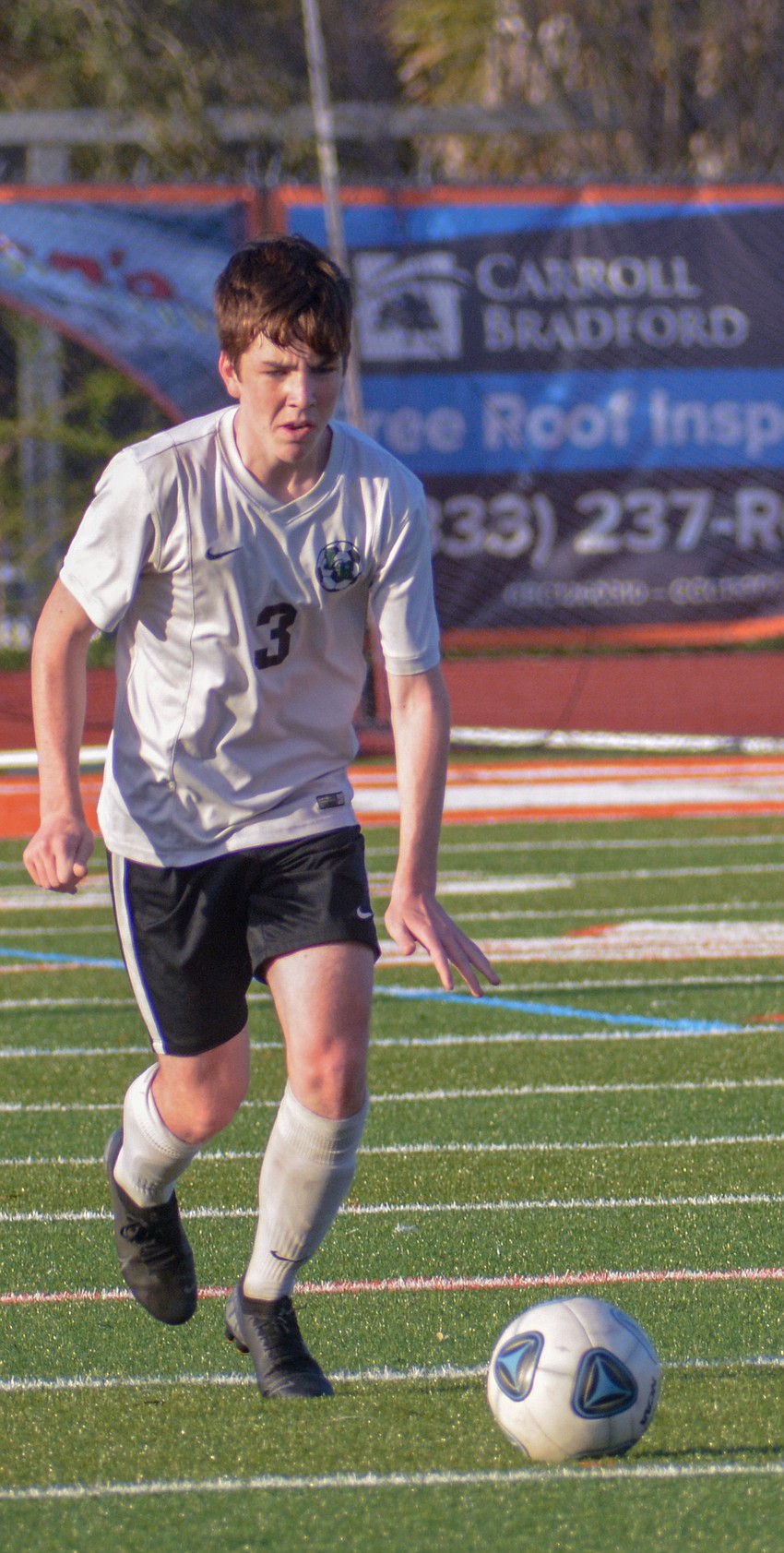 Sophomore midfielder Sam Leavy gears up for a long pass.
