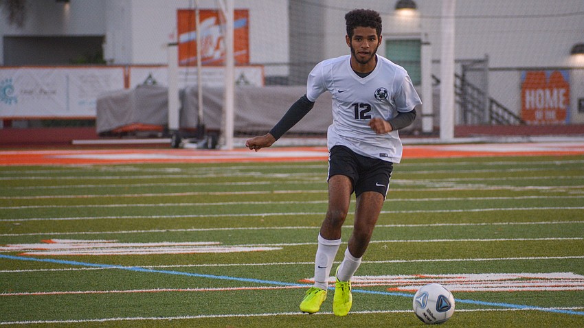 Mustangs senior forward Naji Greene-Villegas looks for a teammate in the open field.