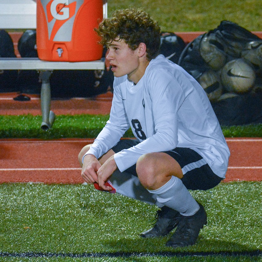 Lakewood Ranch senior Jacob Jordan squats on the sideline after the team's 2-1 loss.