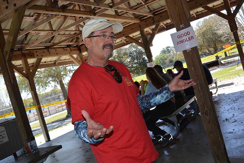 Lakewood Ranch Anglers Club member and beach fisherman Steve Herich teaches the children how to be 