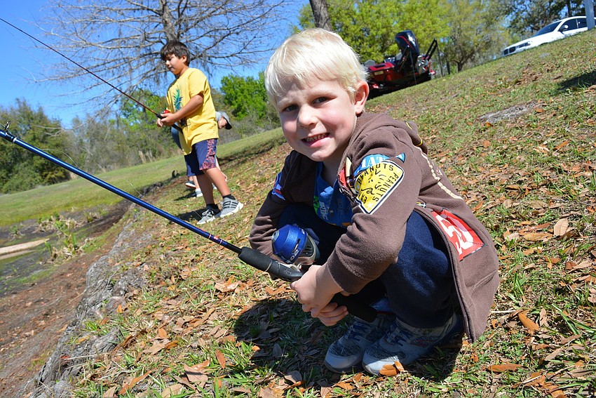 Four-year-old Owen Moseley, of Greenbrook, practiced his casting alongside his brother, Liam, 9, not pictured.