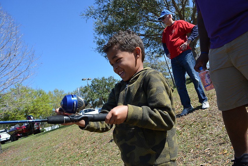 Five-year-old East County resident Ben Livingston honed his casting skills. It was only his second time fishing with his dad, Donnell Livingston.