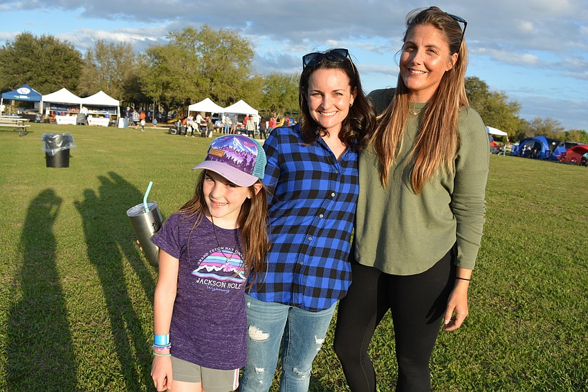 Lakewood Ranch's Alexandra and Desiree Mahiquez and friend Ashley Brown enjoy all the family activities.
