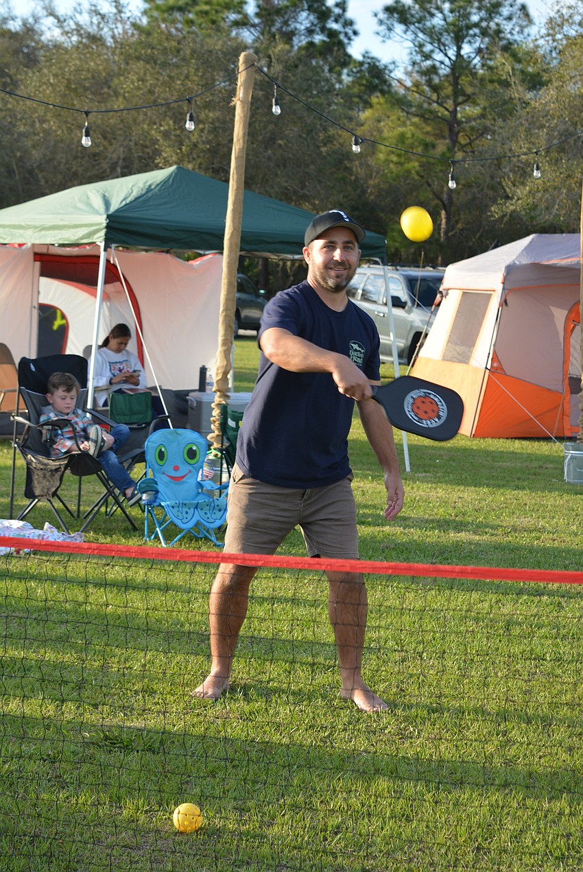 Venice resident Casey Hodge plays pickleball against friends Nicole Pies and Ryan Hendrix, of Lakewood Ranch (not pictured).