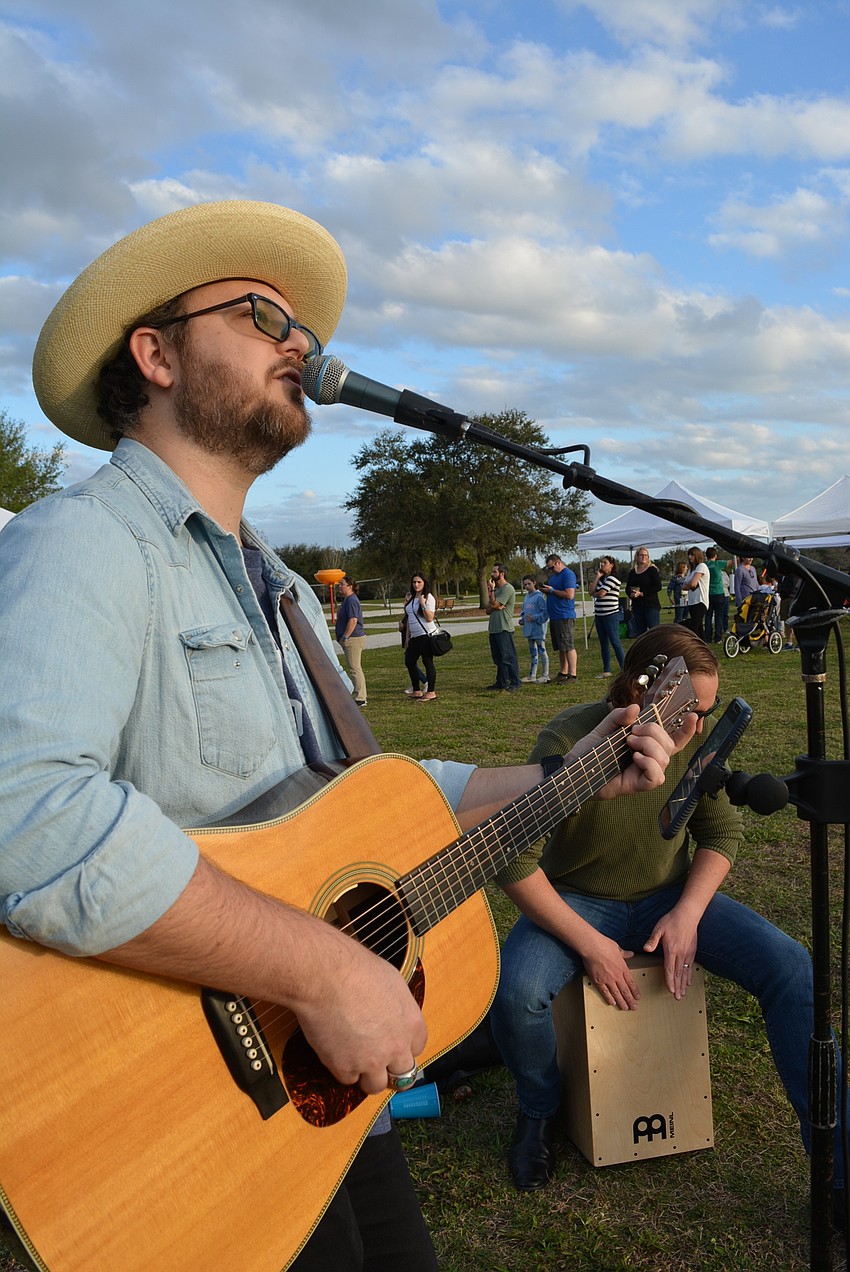 Musician Justin Layman, accompanied by Steve Durst on percussion,  performed cover songs to add to the ambience.