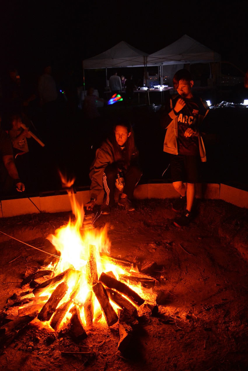 Venice's Jennifer Johnson and her 11-year-old son, Ty Johnson,  cooked a s'more in tact over the fire.
