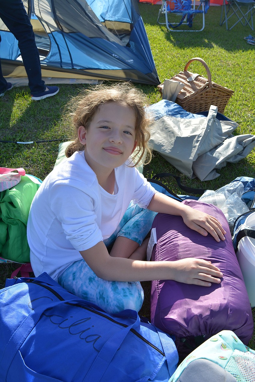 Lakewood Ranch's Sol Briceno, 7, says she is looking forward to hearing the crickets chirp at night.