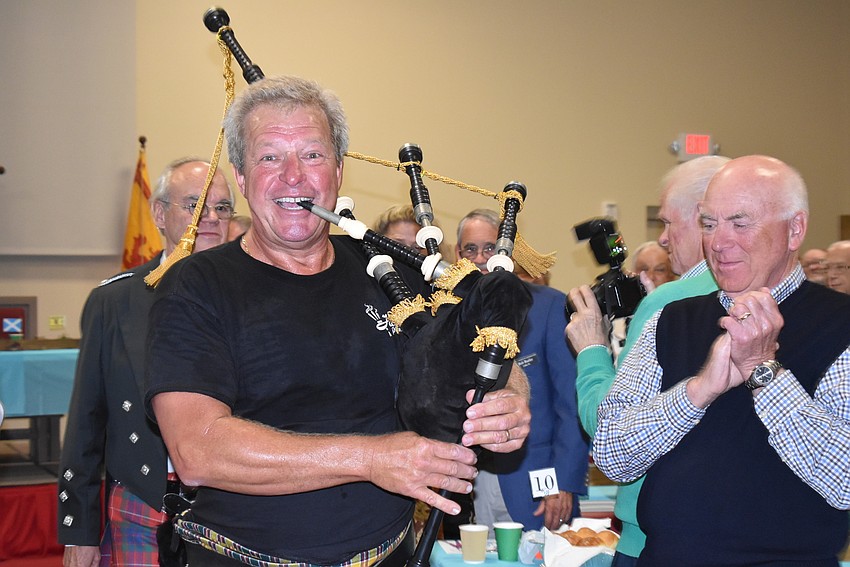 Gary Reinstrom plays his way out of the dining room.