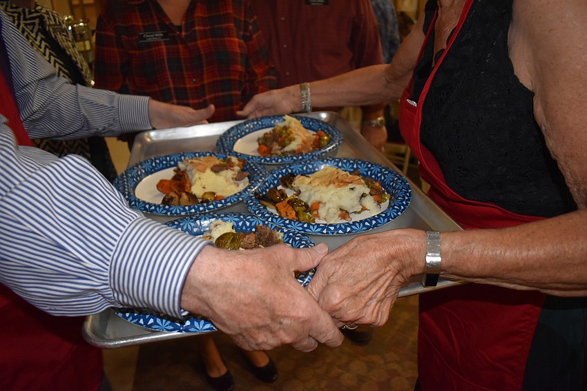 Dinner comes out in waves.
