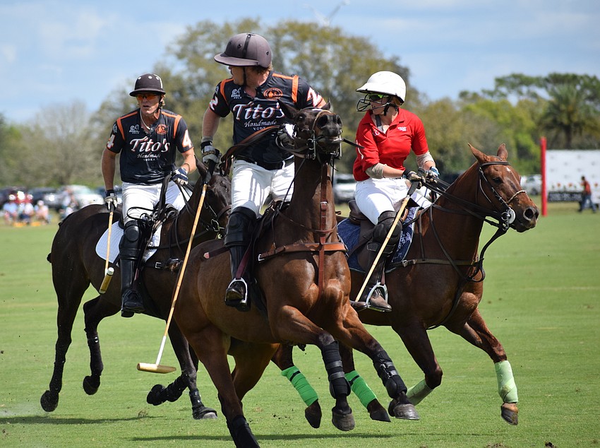 Tito's Stuart Campbell and James Uihlein and Hillcroft's Pippa Campbell have to put on the breaks as the ball changes direction.