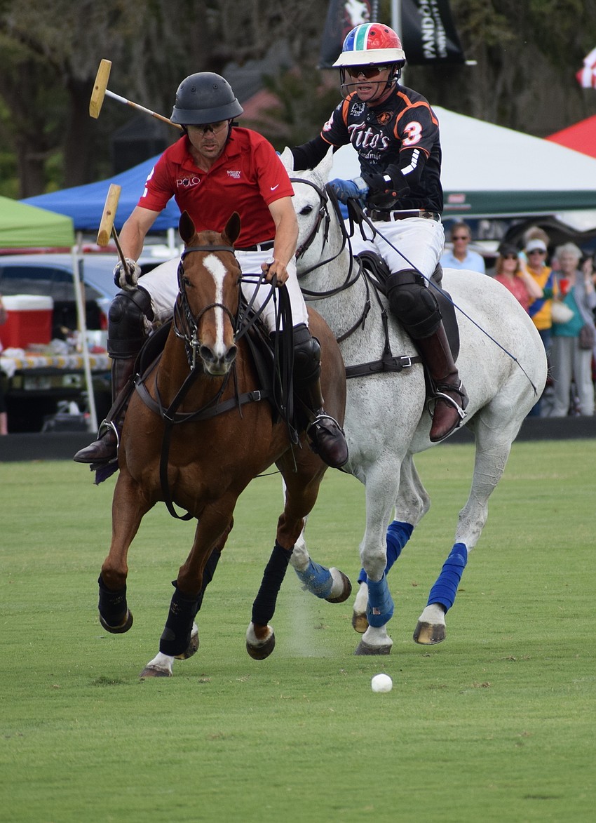 Hillcroft's Neil Osburg  breaks away while Tito's Joe Wayne Barry tries to chase him down.