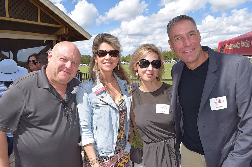 John and Toni Perren and Karen and Rich Medford were enjoying their day at the Observer Cup.