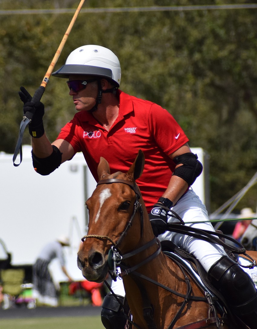 Hillcroft's James Miller acknowledges the crowd before the match begins.