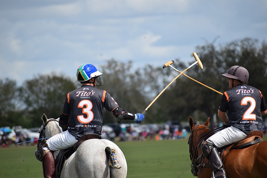 Tito's Joe Wayne Barry celebrates his goal with teammate James Uihlein.