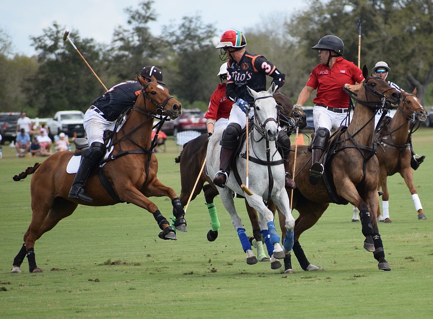 The players scramble to change direction after the ball squirts out.