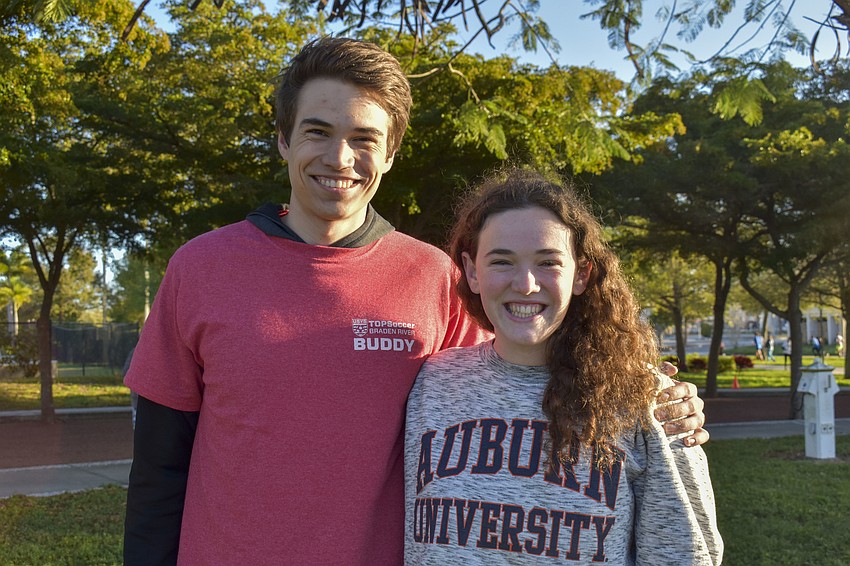 Erick Barnard, 20, and Brianna Trecartin, 19, started the race for their CAS project.