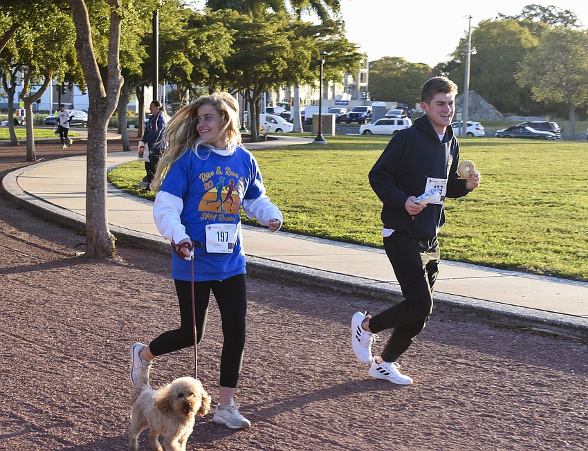Juliana Rendle run with her dog Rondo and Noah Fischer